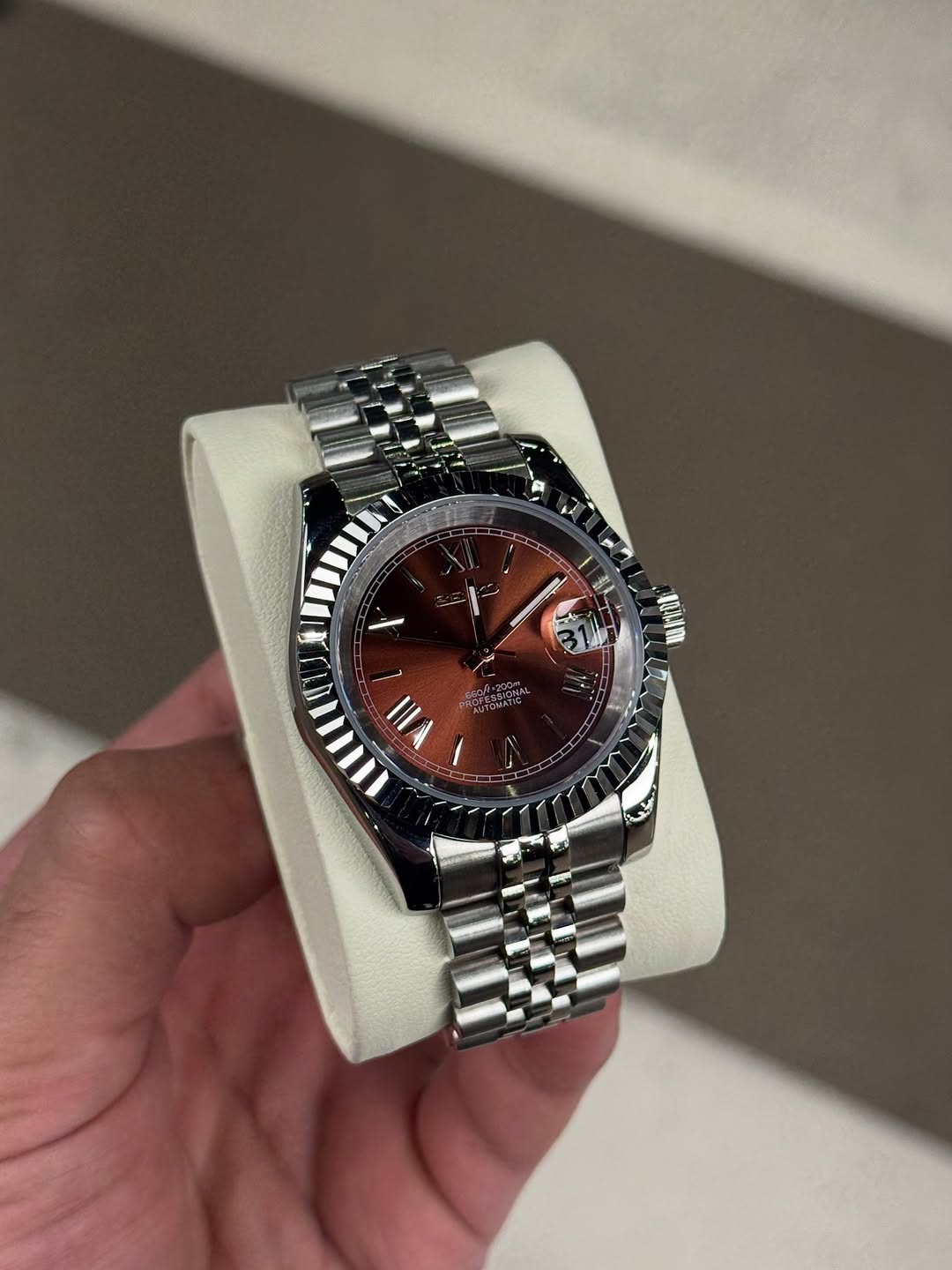 Chocolate Roman Dial Seiko mod watch close-up with case and dial details