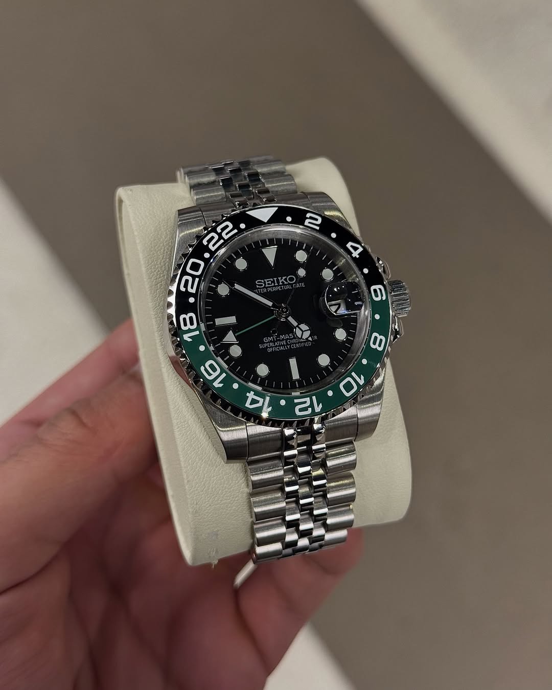 Lime Green Gmt Seiko mod watch close-up with case and dial details