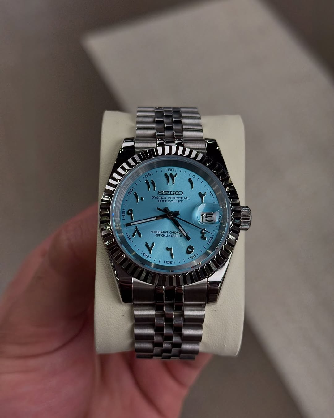Sky Blue Arabic Dial Seiko mod watch front view with detailed dial