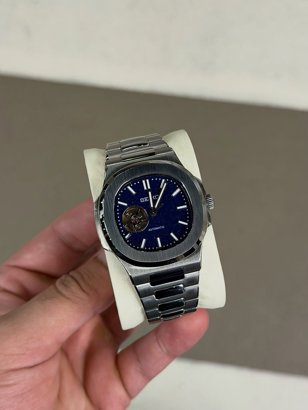 Blue Open Heart Seiko mod watch close-up with case and dial details