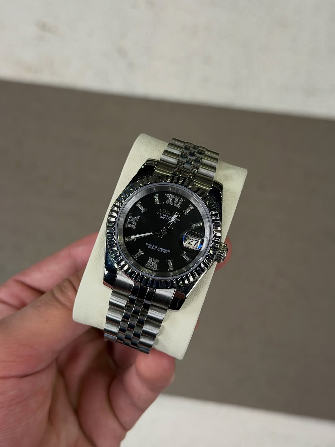 Black Roman Dial Seiko mod watch close-up with case and dial details