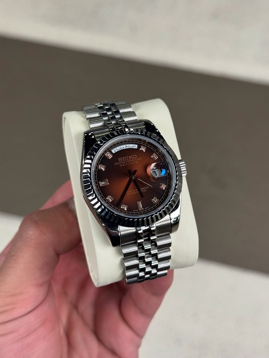 Champagne Diamond Seiko mod watch close-up with case and dial details