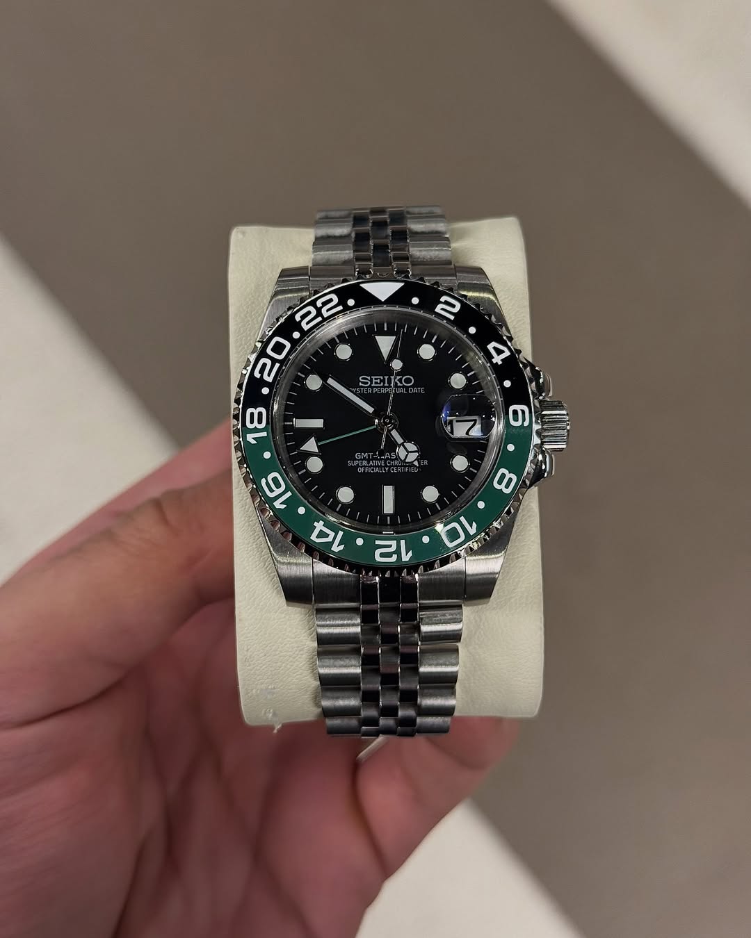 Lime Green Gmt Seiko mod watch front view with detailed dial