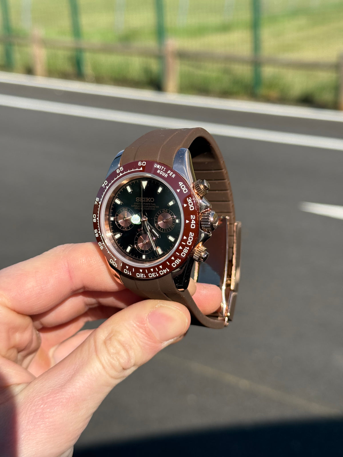 Bronze Roman Chronograph Seiko mod watch close-up with case and dial details