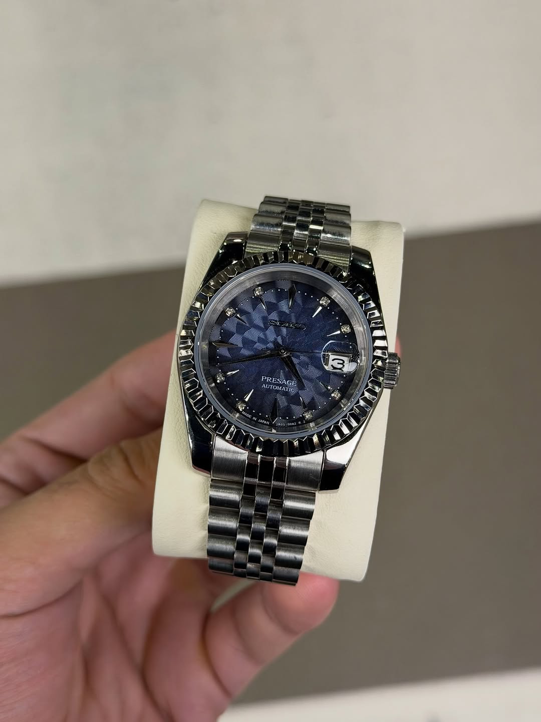 Geometric Diamond Dial Seiko mod watch on wrist with luxury design