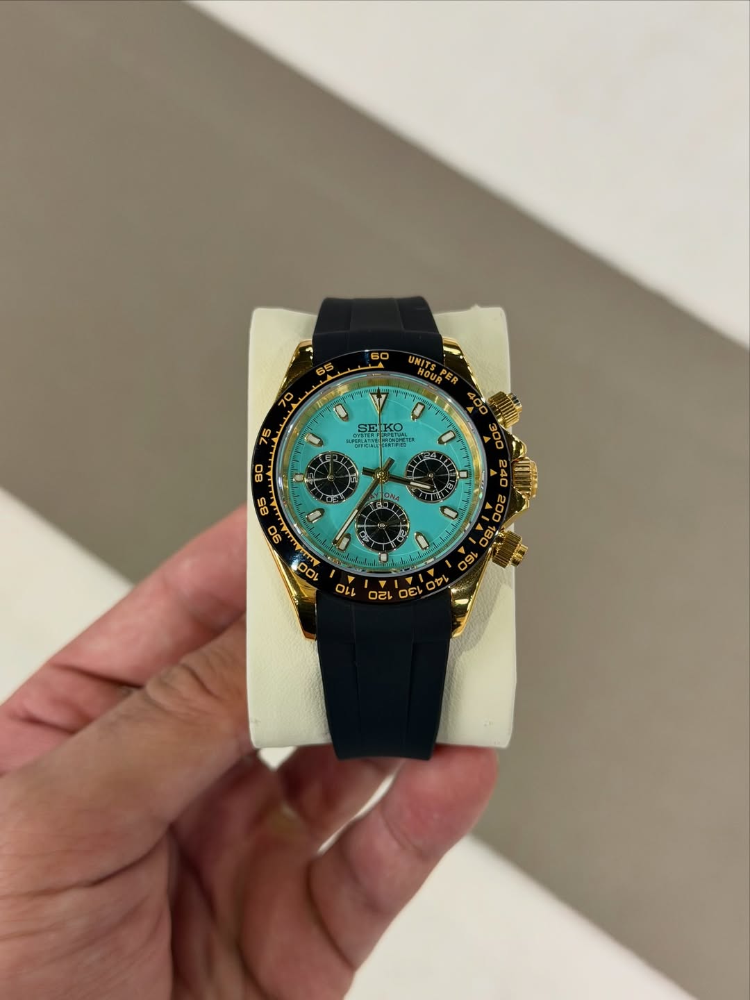 Turquoise Spark Chronograph Seiko mod watch front view with detailed dial