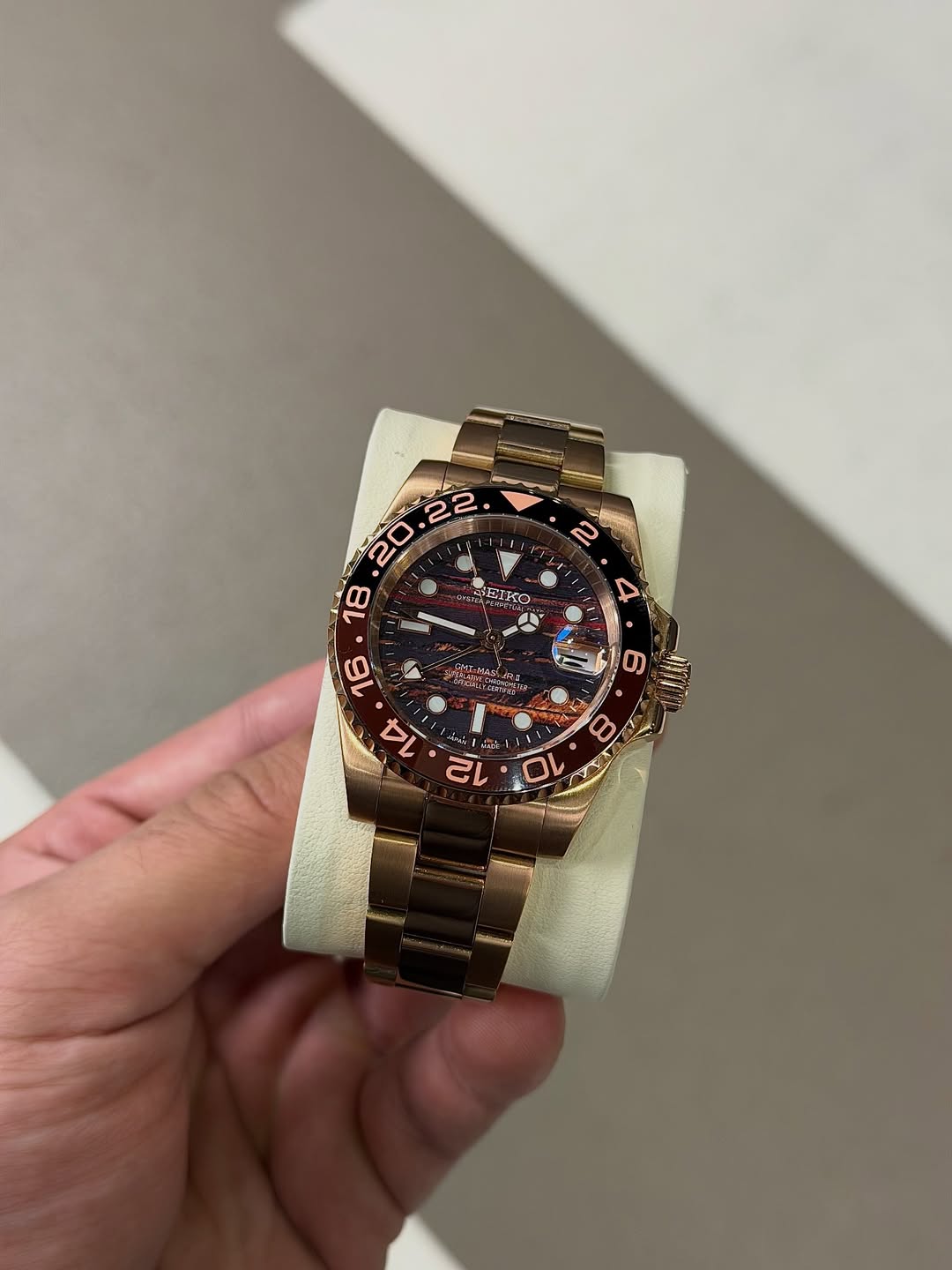 Rose Tiger Gmt Seiko mod watch on wrist with luxury design