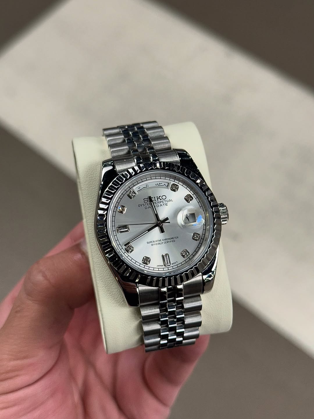 Pearl White Diamond Seiko mod watch on wrist with luxury design