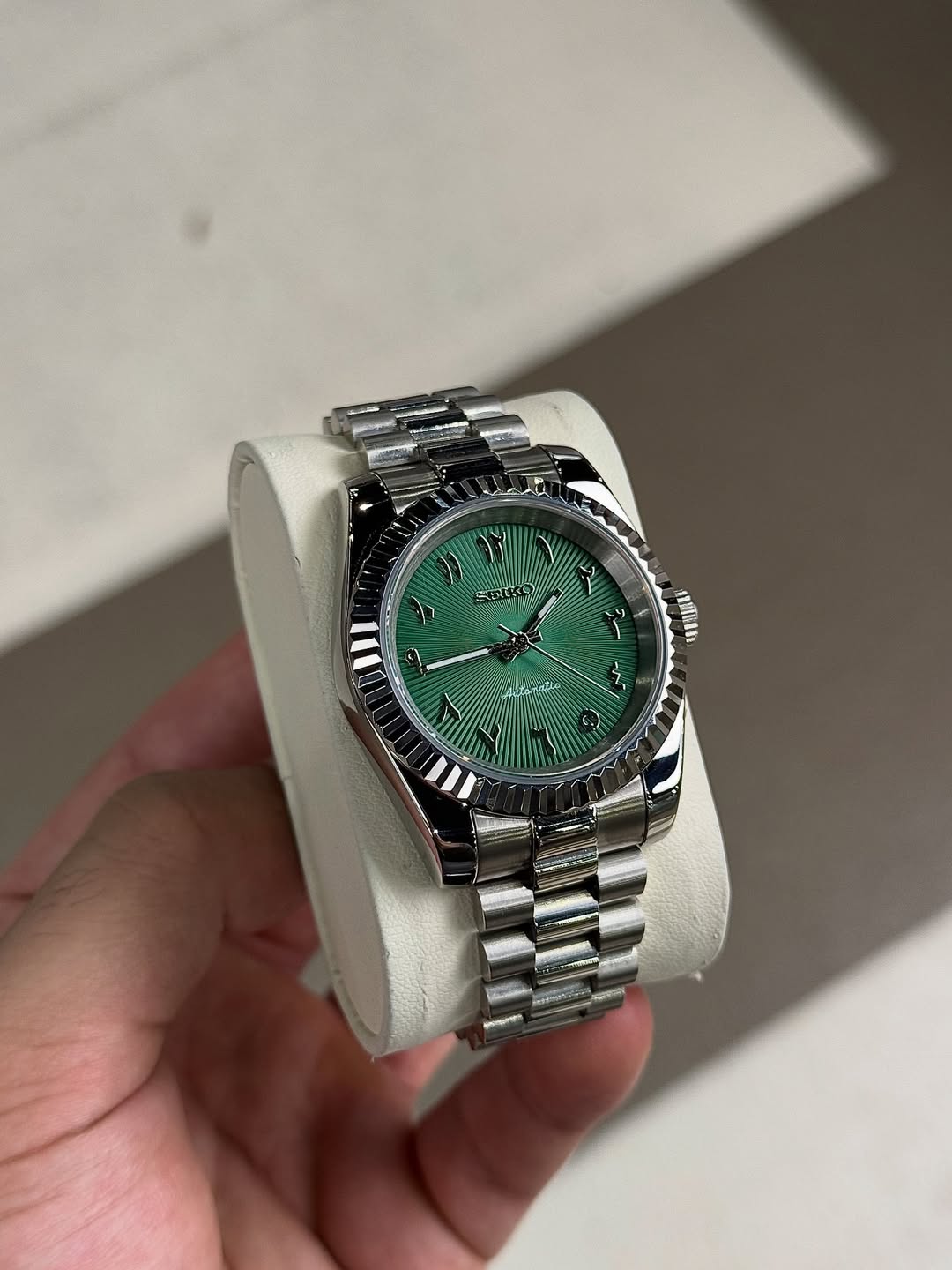 Forest Green Arabic Dial Seiko mod watch close-up with case and dial details