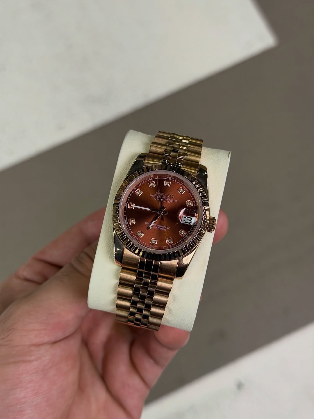 Rose Diamond Dial Seiko mod watch on wrist with luxury design