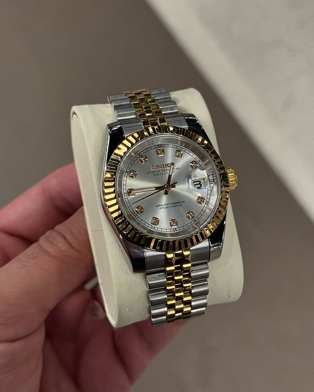 Golden Diamond Dial Seiko mod watch on wrist with luxury design