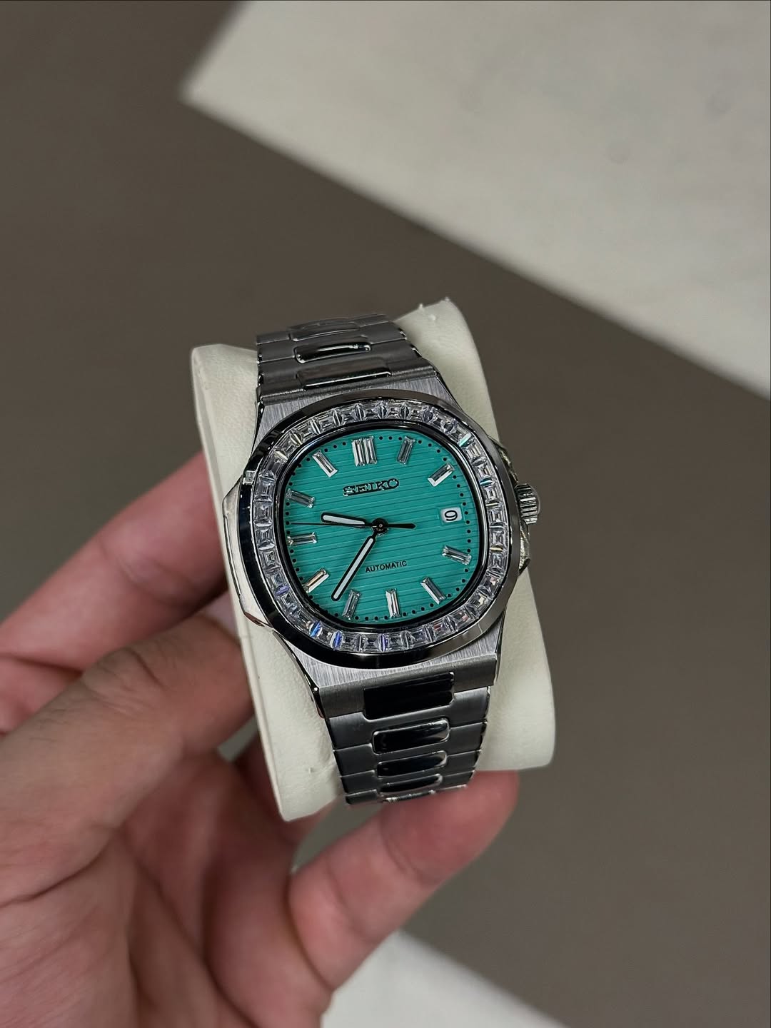 Tiffany Baguette Seiko mod watch on wrist with luxury design