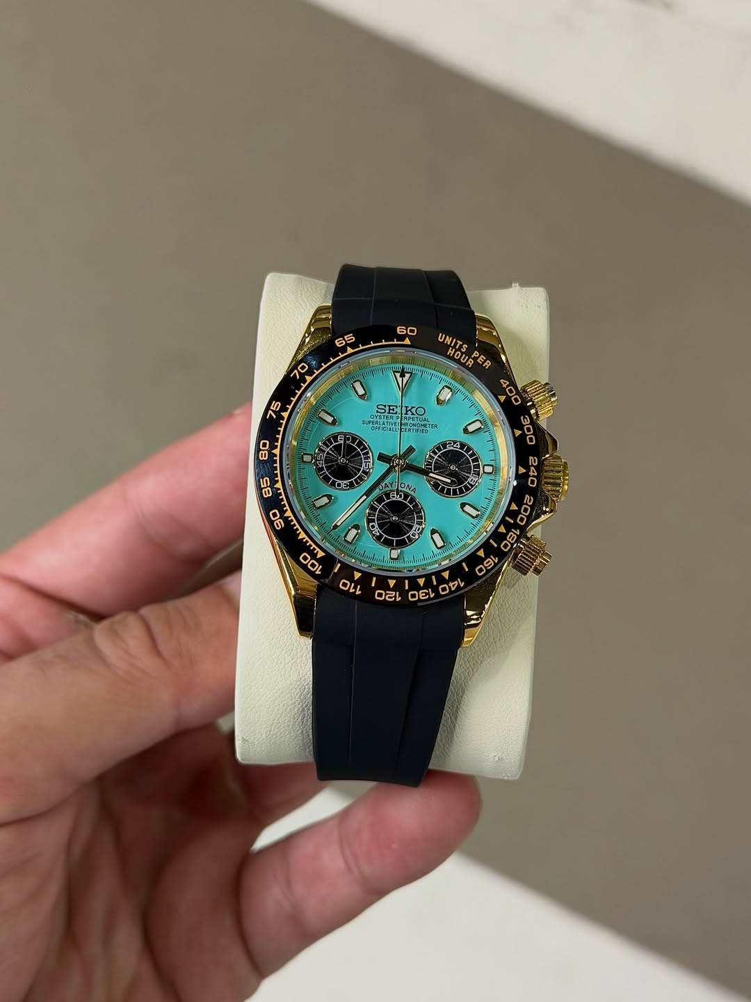Turquoise Spark Chronograph Seiko mod watch on wrist with luxury design