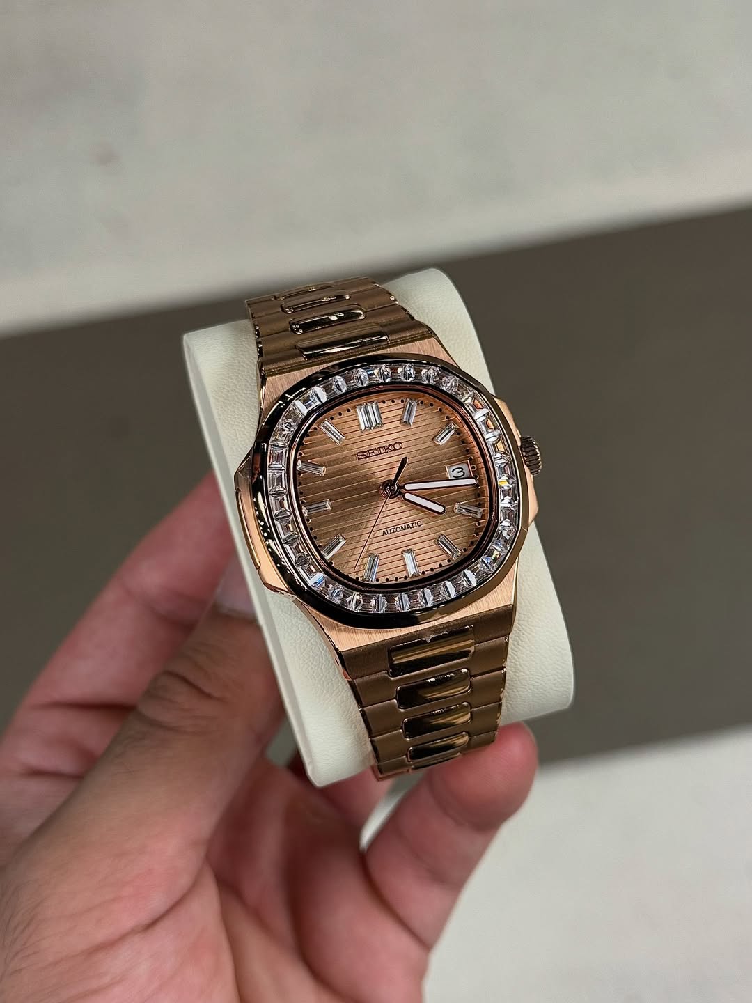 Diamond Rose Seiko mod watch on wrist with luxury design