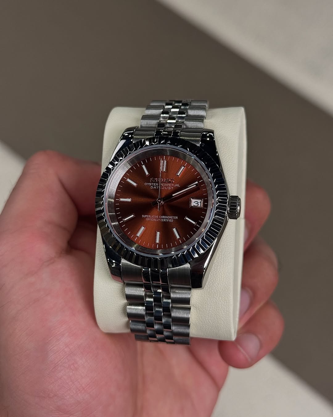 Chocolate Roman Brown Seiko mod watch close-up with case and dial details