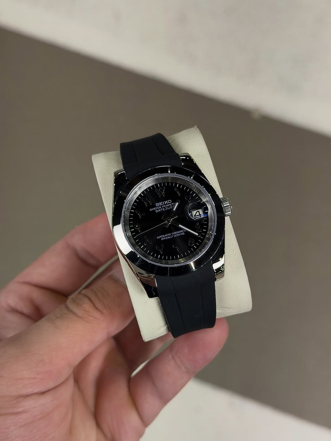 Black Arabic Dial Seiko mod watch close-up with case and dial details