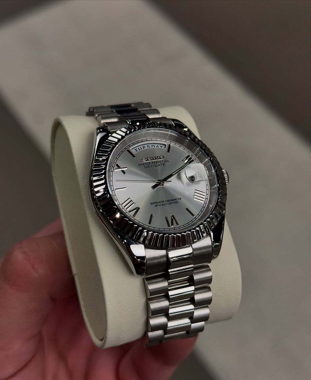 Platinum Roman Seiko mod watch close-up with case and dial details