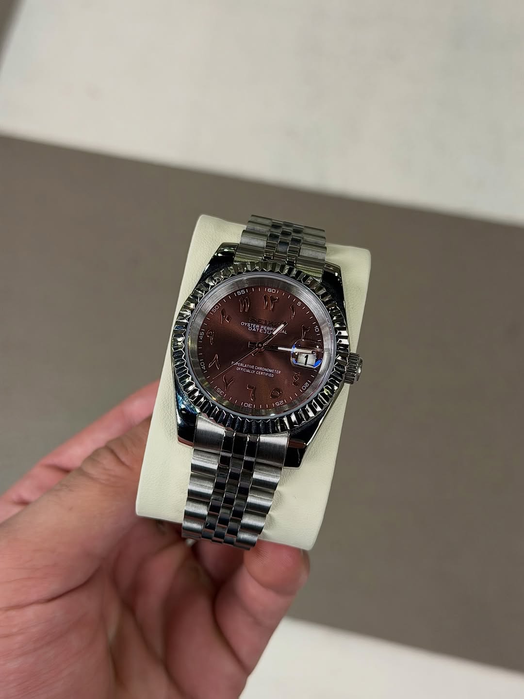 Mocha Brown Arabic Dial Seiko mod watch on wrist with luxury design