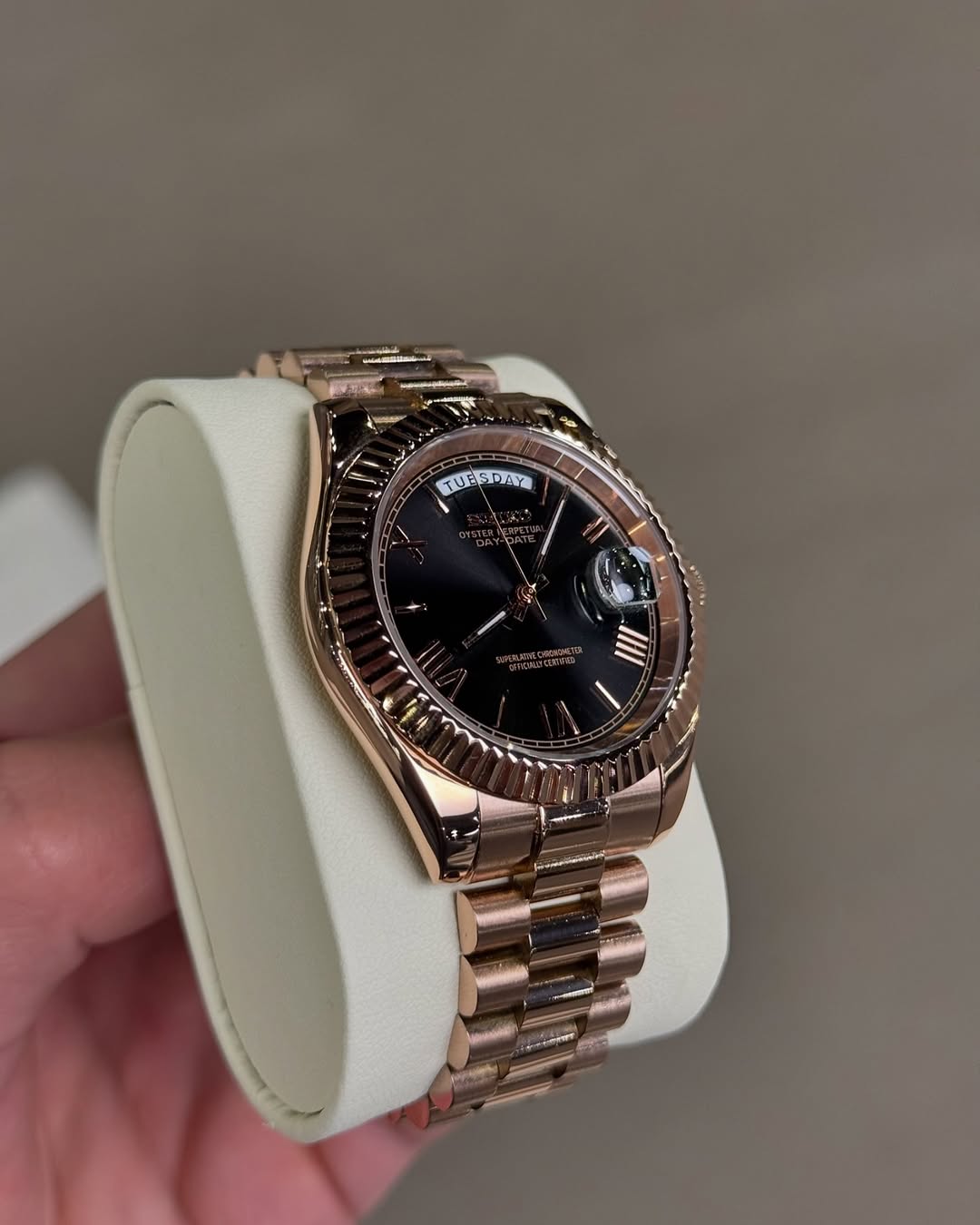 Gold Roman Seiko mod watch on wrist with luxury design