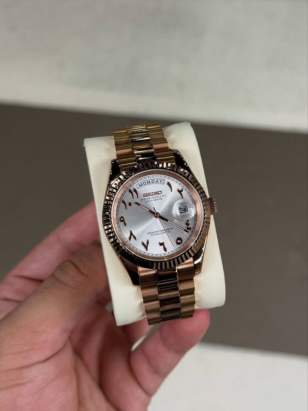 Rose Aura Seiko mod watch close-up with case and dial details