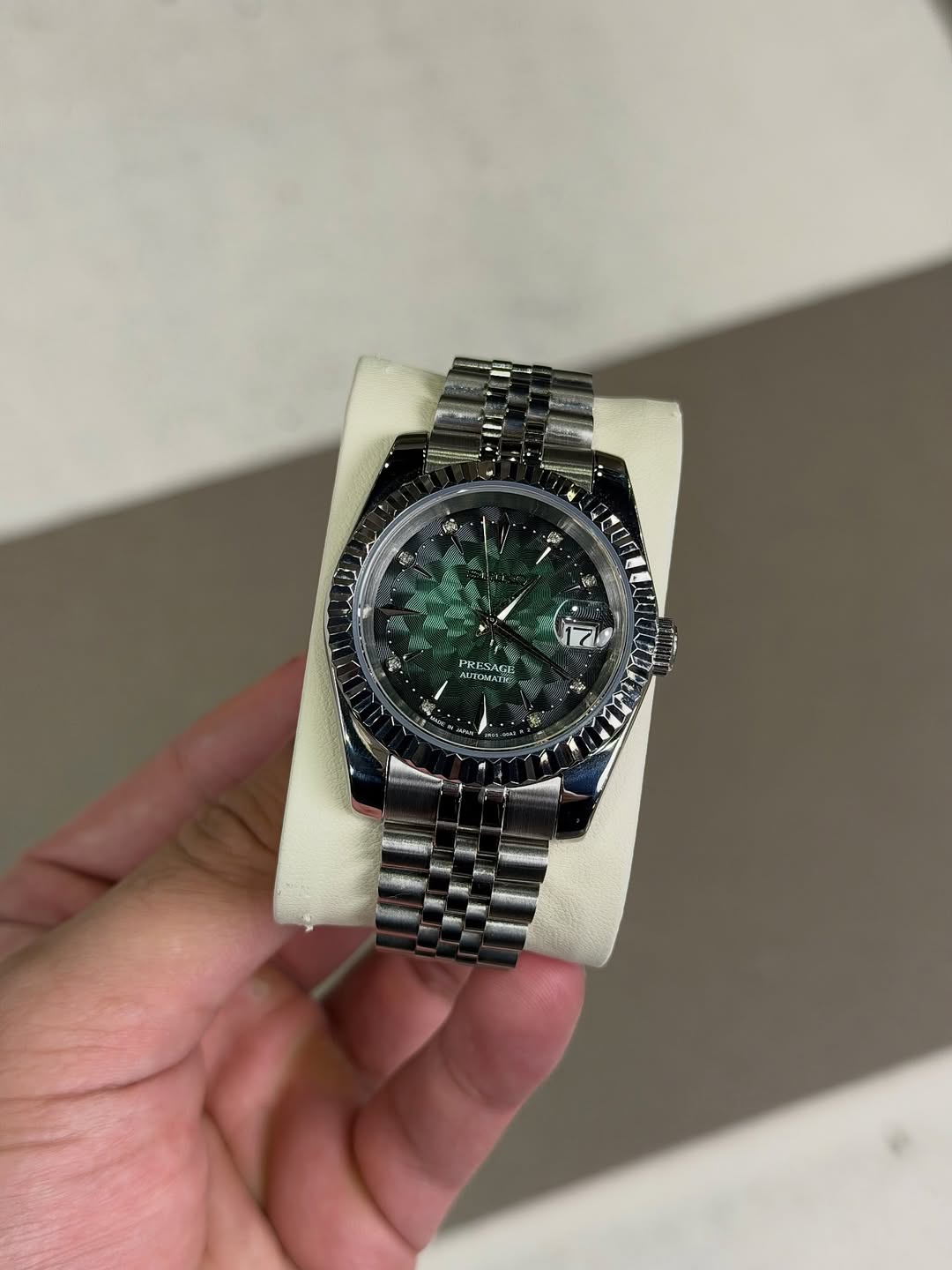 Geometric Mint Green Dial Seiko mod watch on wrist with luxury design