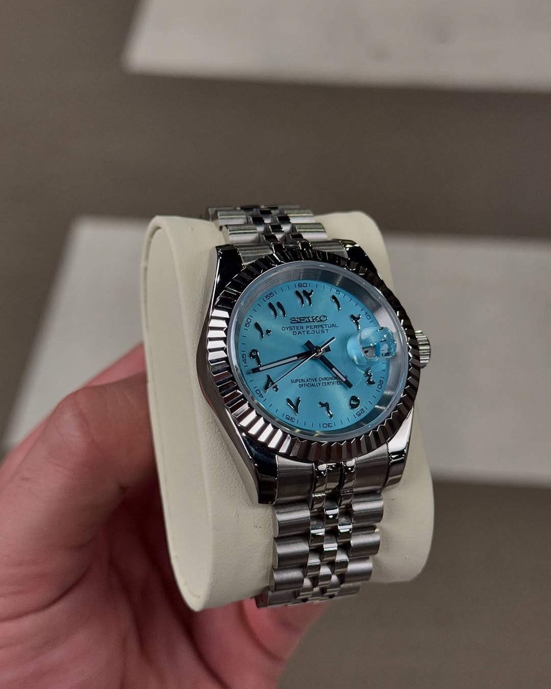 Sky Blue Arabic Dial Seiko mod watch close-up with case and dial details