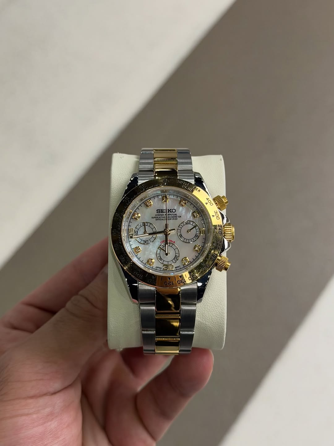 Gold White Roman Chronograph Seiko mod watch front view with detailed dial