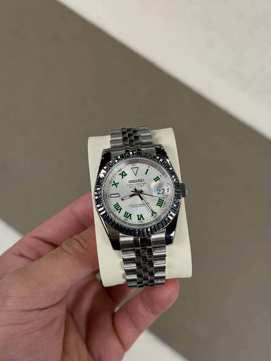 Hunter Green Dial Seiko mod watch close-up with case and dial details