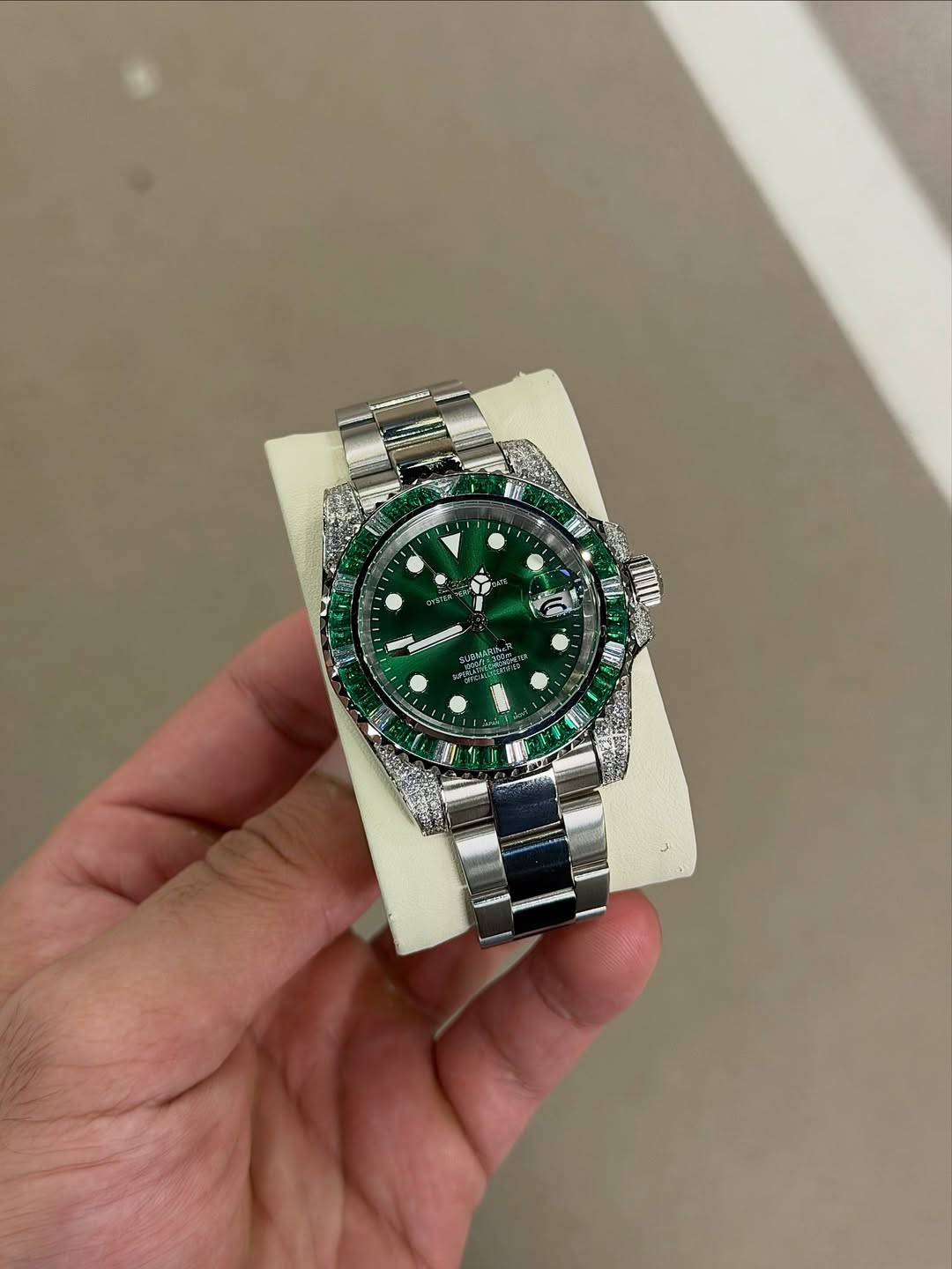 Raven Green Gmt Seiko mod watch on wrist with luxury design