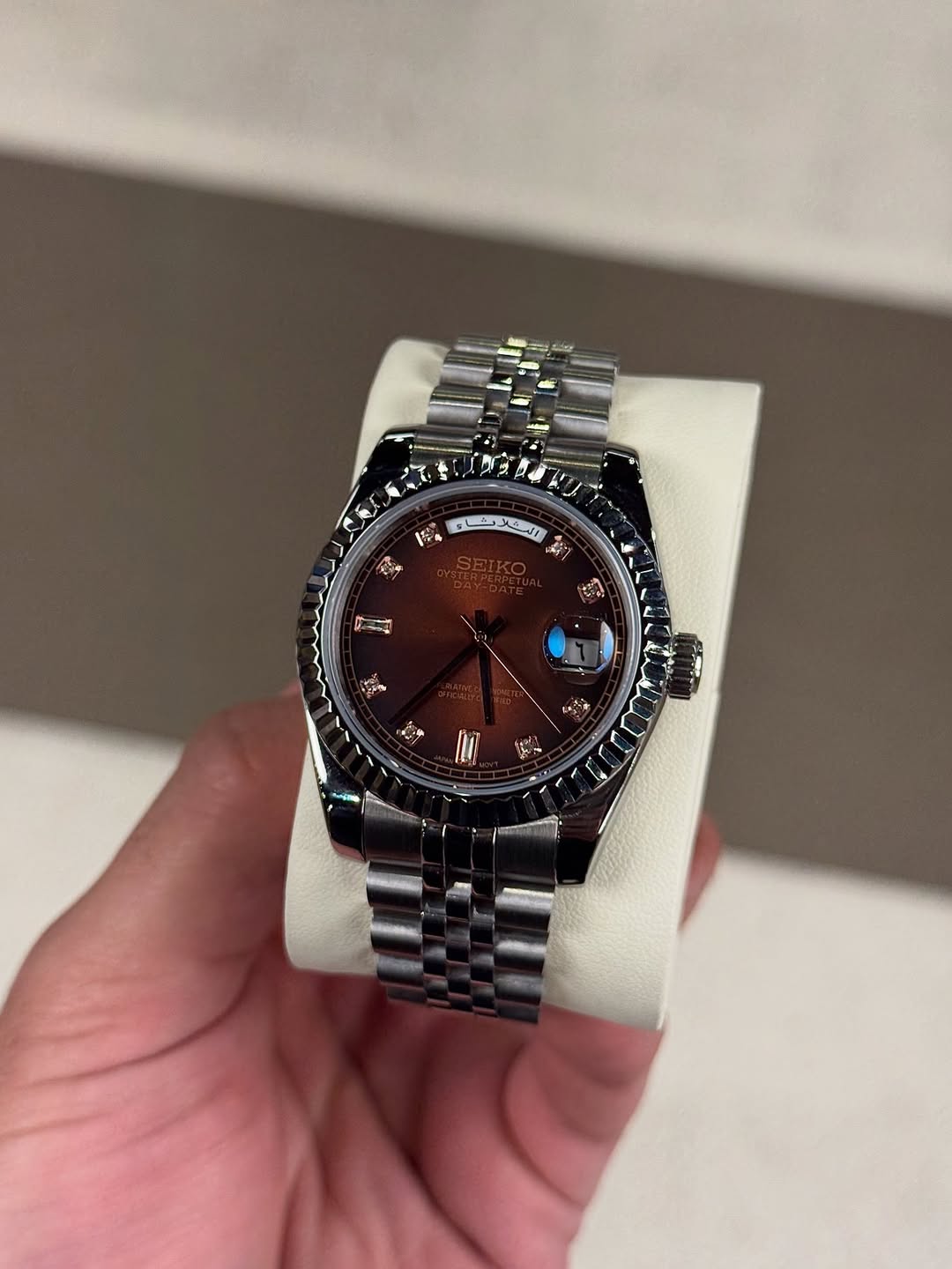 Champagne Diamond Seiko mod watch on wrist with luxury design