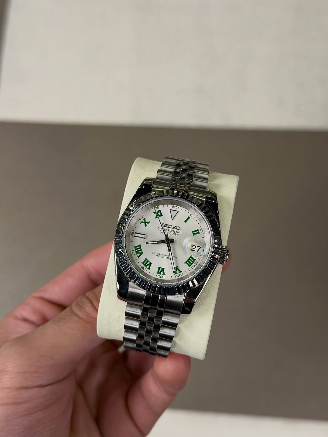 Hunter Green Dial Seiko mod watch on wrist with luxury design