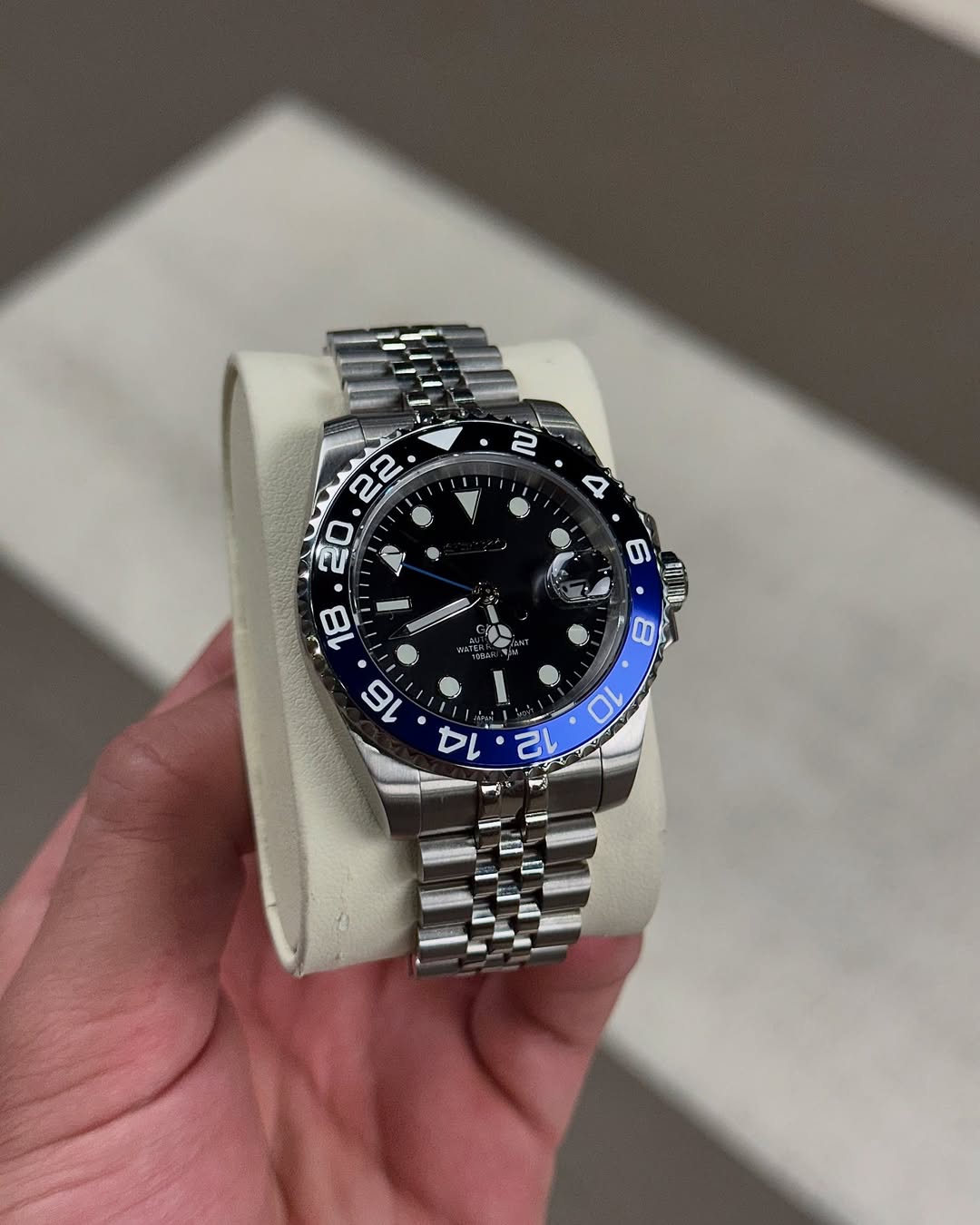 Thunder Blue Gmt Seiko mod watch close-up with case and dial details