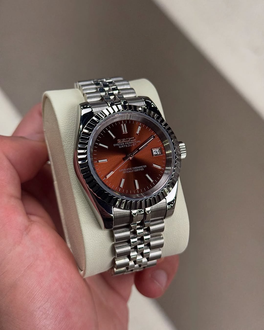 Chocolate Roman Brown Seiko mod watch on wrist with luxury design