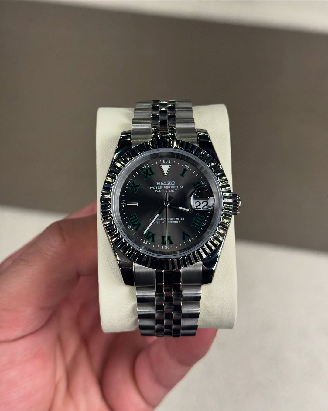 Green Roman Dial Seiko mod watch front view with detailed dial