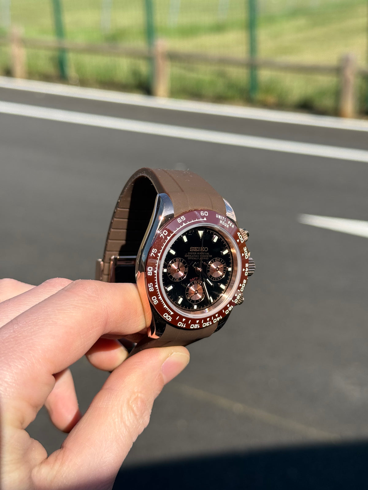 Bronze Roman Chronograph Seiko mod watch on wrist with luxury design