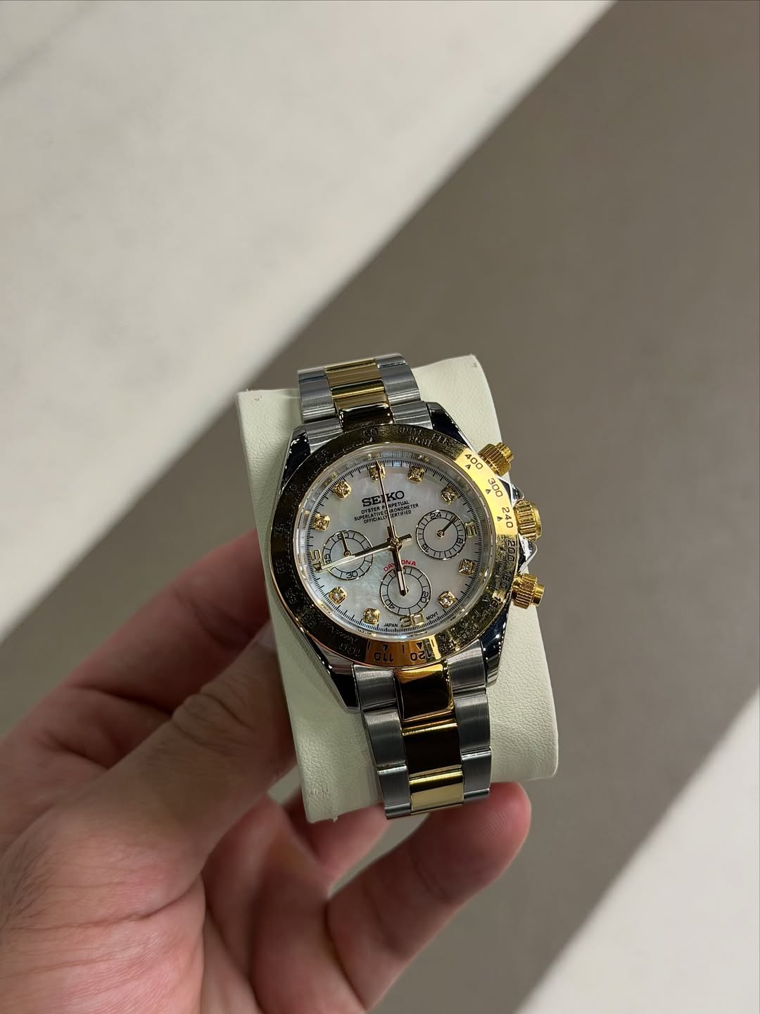 Gold White Roman Chronograph Seiko mod watch close-up with case and dial details