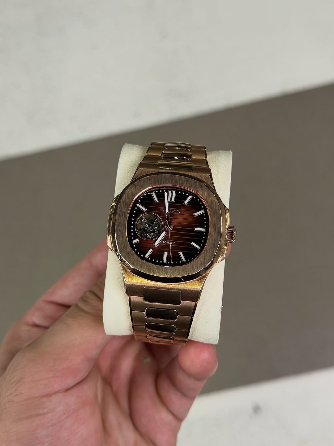 Rose Gold Open Heart Seiko mod watch close-up with case and dial details