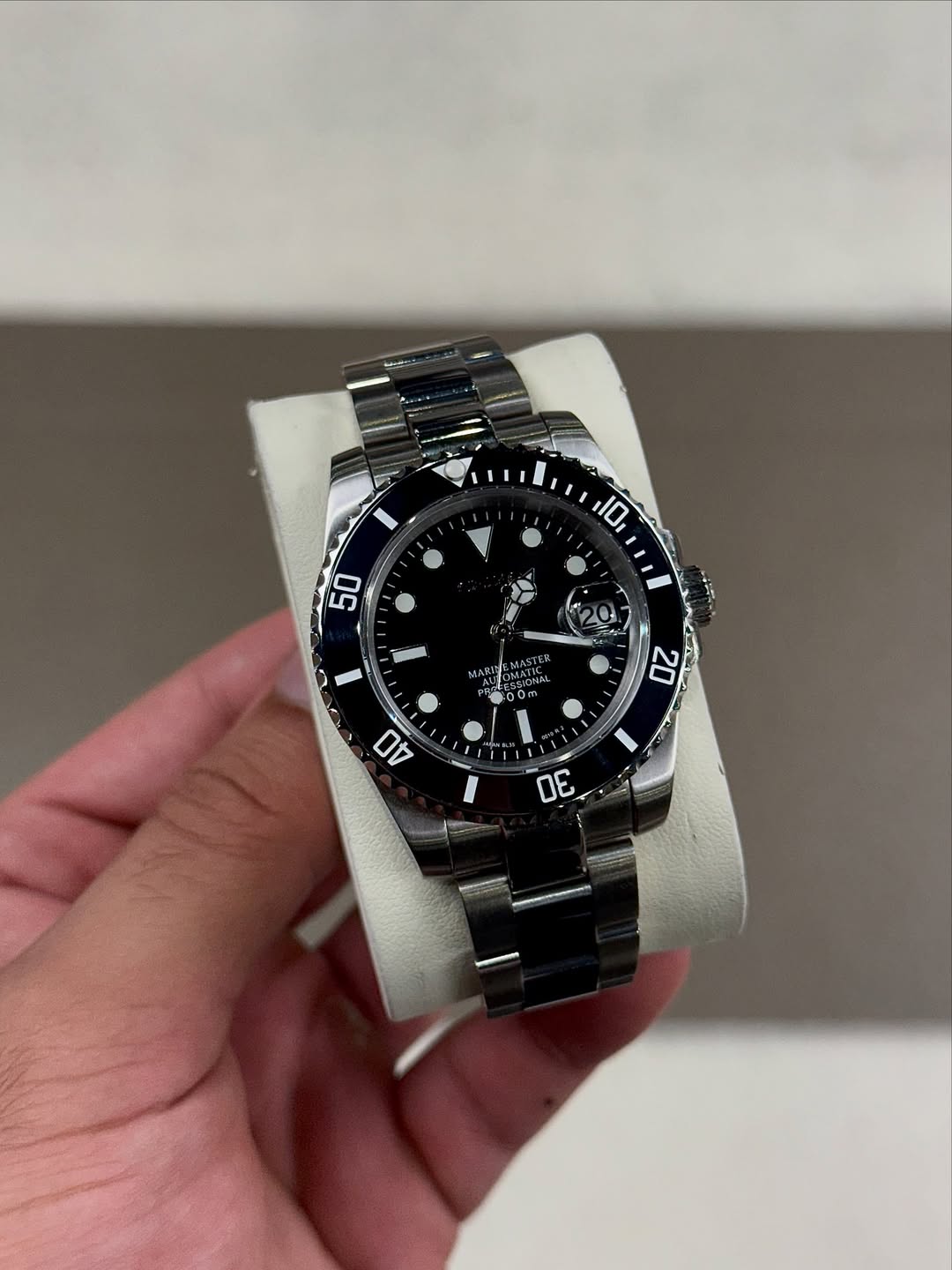 Dark Marine Gmt Seiko mod watch close-up with case and dial details