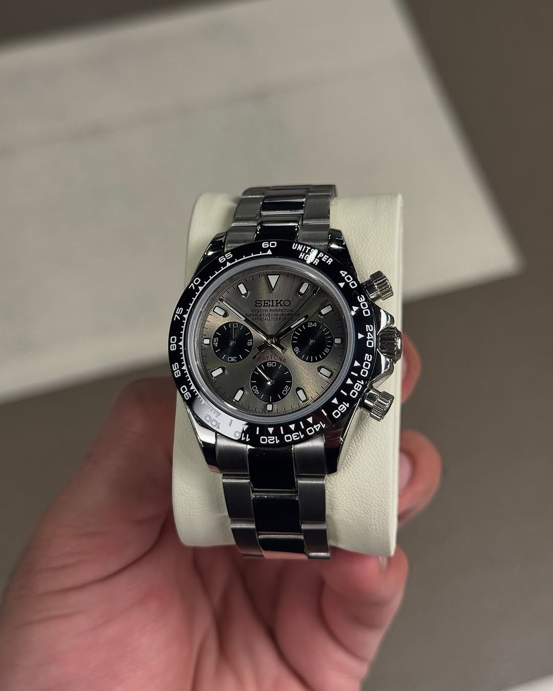 Satin Grey Racer Chronograph Seiko mod watch on wrist with luxury design