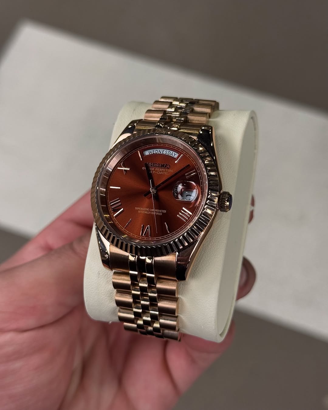 Chocolate Roman Seiko mod watch close-up with case and dial details