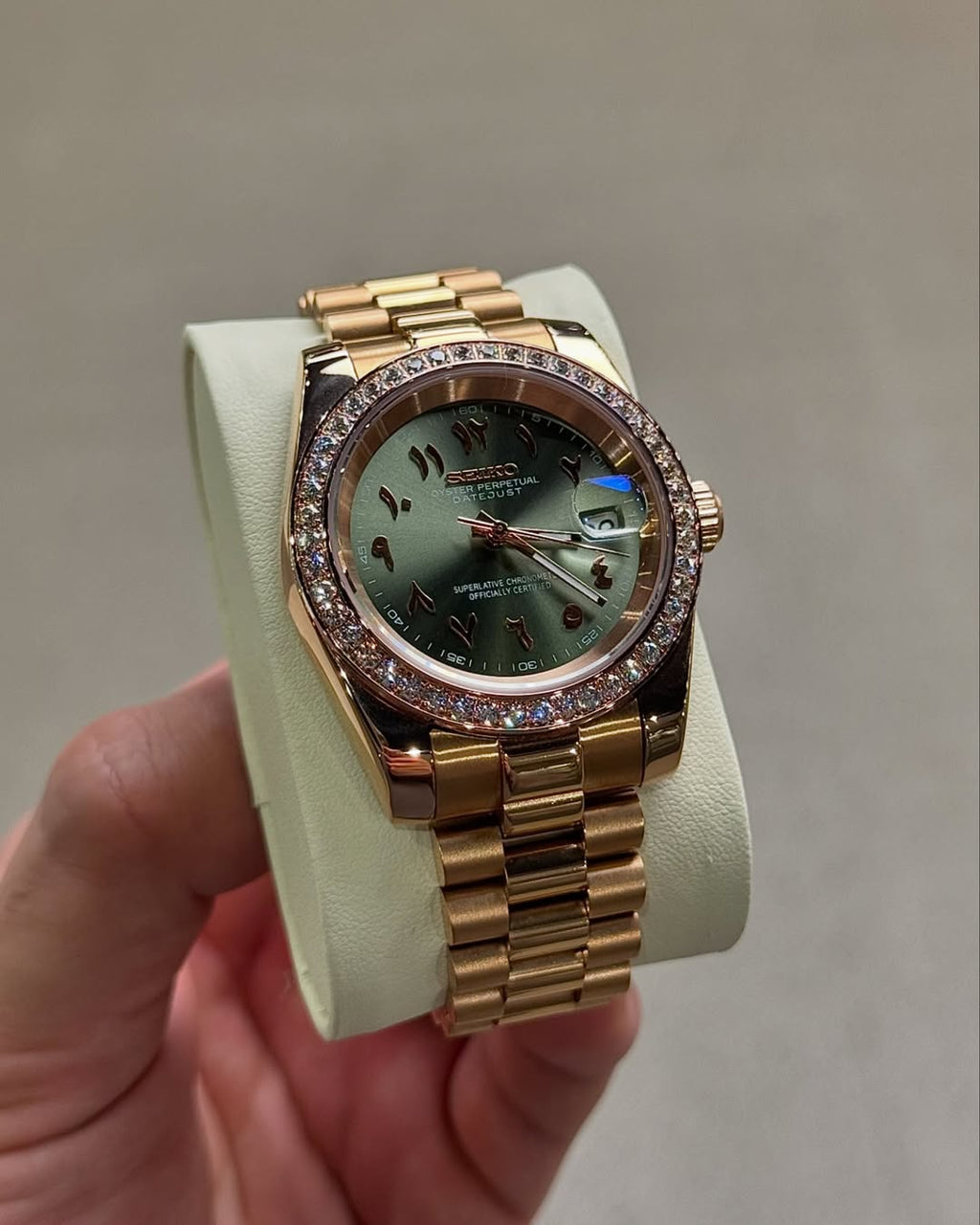 Olive Arabic Dial Seiko mod watch on wrist with luxury design