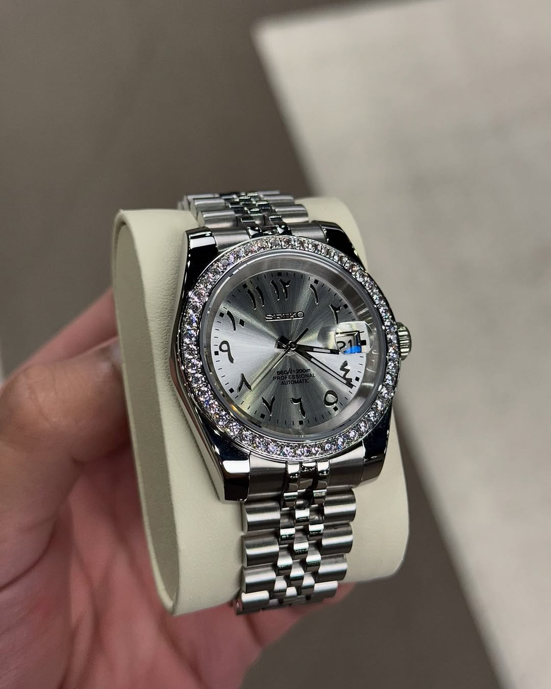 Titanium Diamond Arabic Dial Seiko mod watch on wrist with luxury design