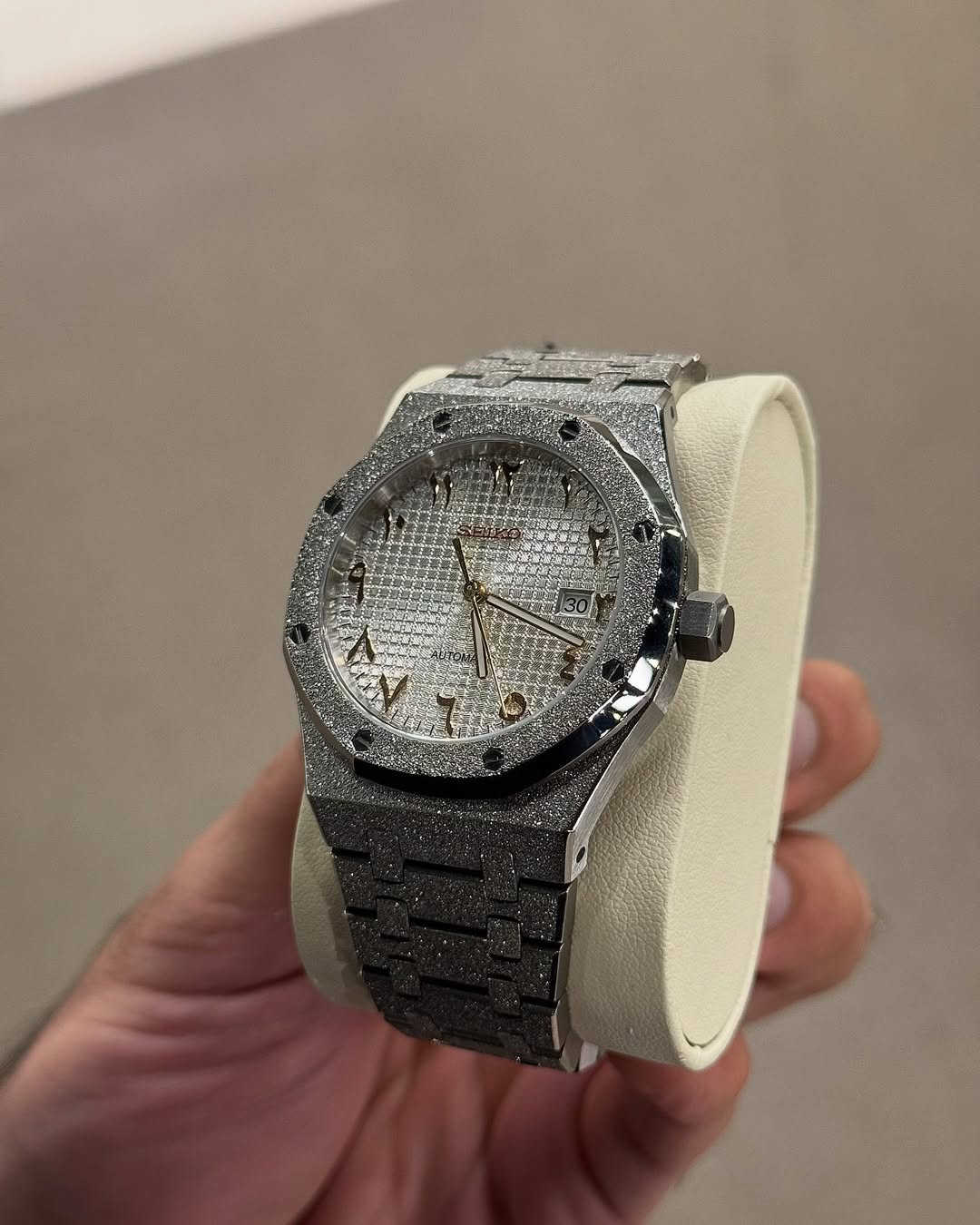 Octagonal Frozen White Arabic Dial Seiko mod watch on wrist with luxury design