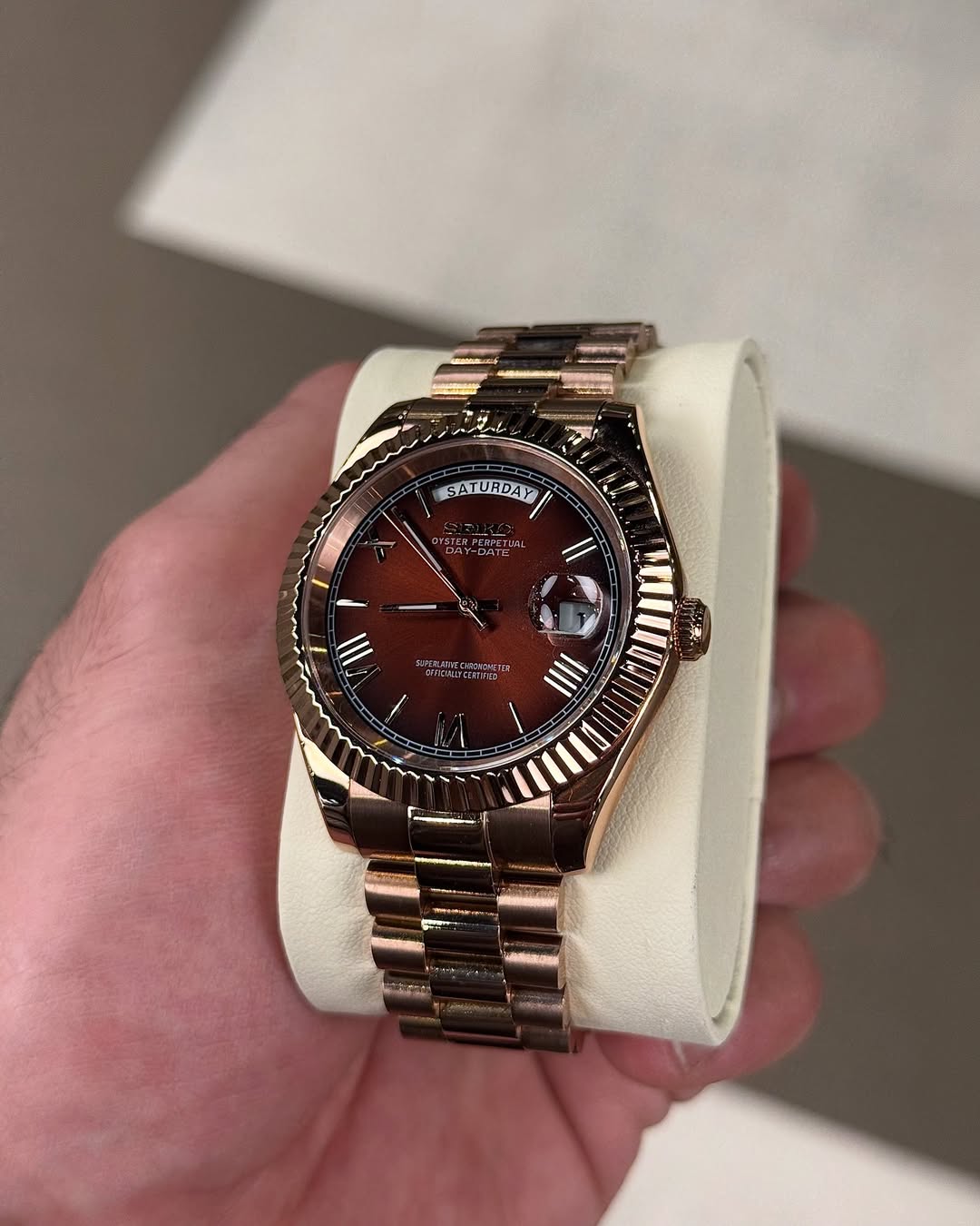 Champagne Gold Roman Seiko mod watch close-up with case and dial details